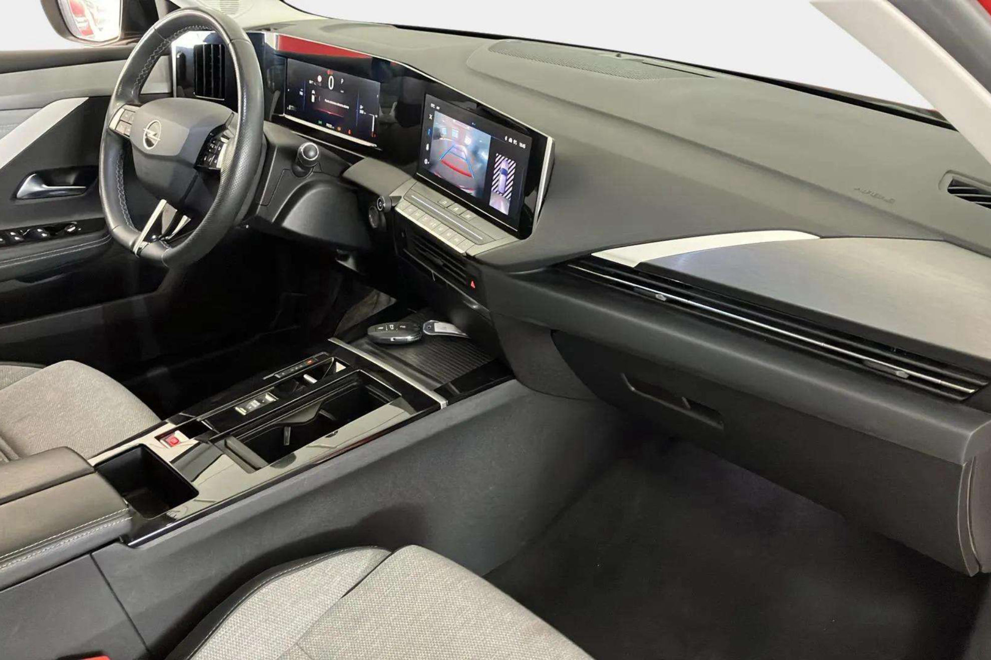 Opel Astra 1.2T XHT Elegance - foto 7