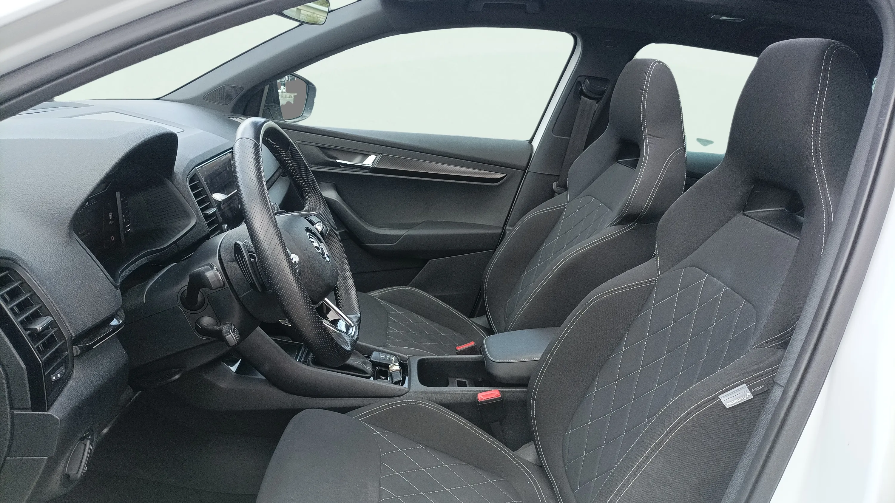 Škoda Karoq 1.5 TSI DSG ACT Scout - foto 16